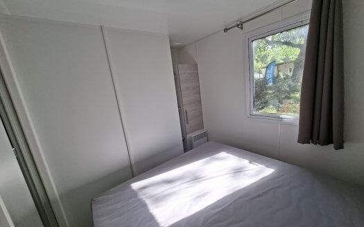 TRIGANO Evo 35 (coloris9 bois ) avec climatisation, terrasse, lave vaisselle